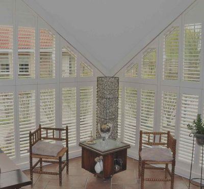 Schraegfenster mit American Shutters